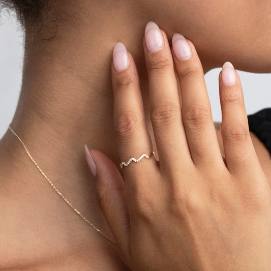 Close detail of the Pavé Wave Stacking Ring in 18K Gold Vermeil with CZ Diamond. Hypoallergenic, no green marks, premium.