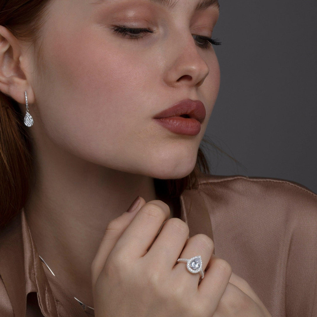 Macro detail of the Pear Cut Diamond Engagement Ring: CZ Diamond set in 18K Gold Vermeil. Tarnish-resistant, handmade.
