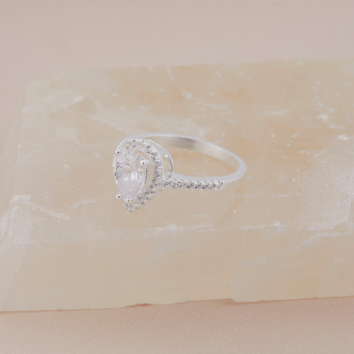 The Pear Cut Diamond Engagement Ring worn in 18K Gold Vermeil — refined accessory for women. Hypoallergenic, no green marks.