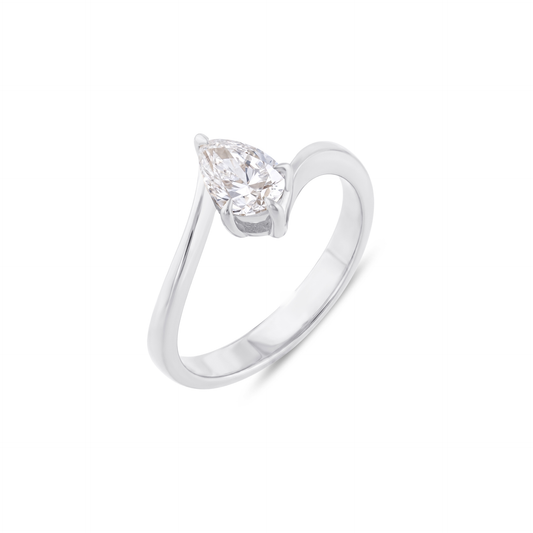 Pear-cut natural diamond bypass solitaire ring in 14K solid white gold, three-quarter view on a white background