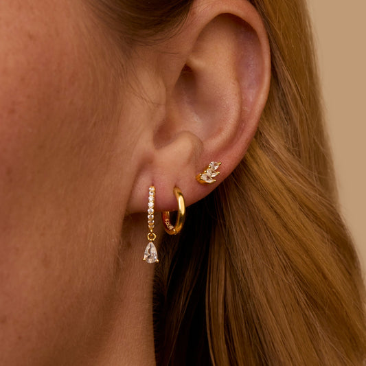 Close detail of the Pear Drop Marquise Cluster Ear Stack in 18K Gold Vermeil with CZ Diamond. Tarnish-resistant, premium.