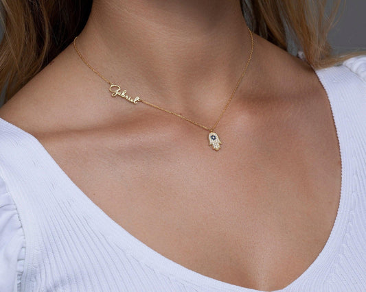 Close detail of the Personalized Hamsa Name Necklace in 18K Gold Vermeil. Safe for sensitive skin, premium handmade jewelry.