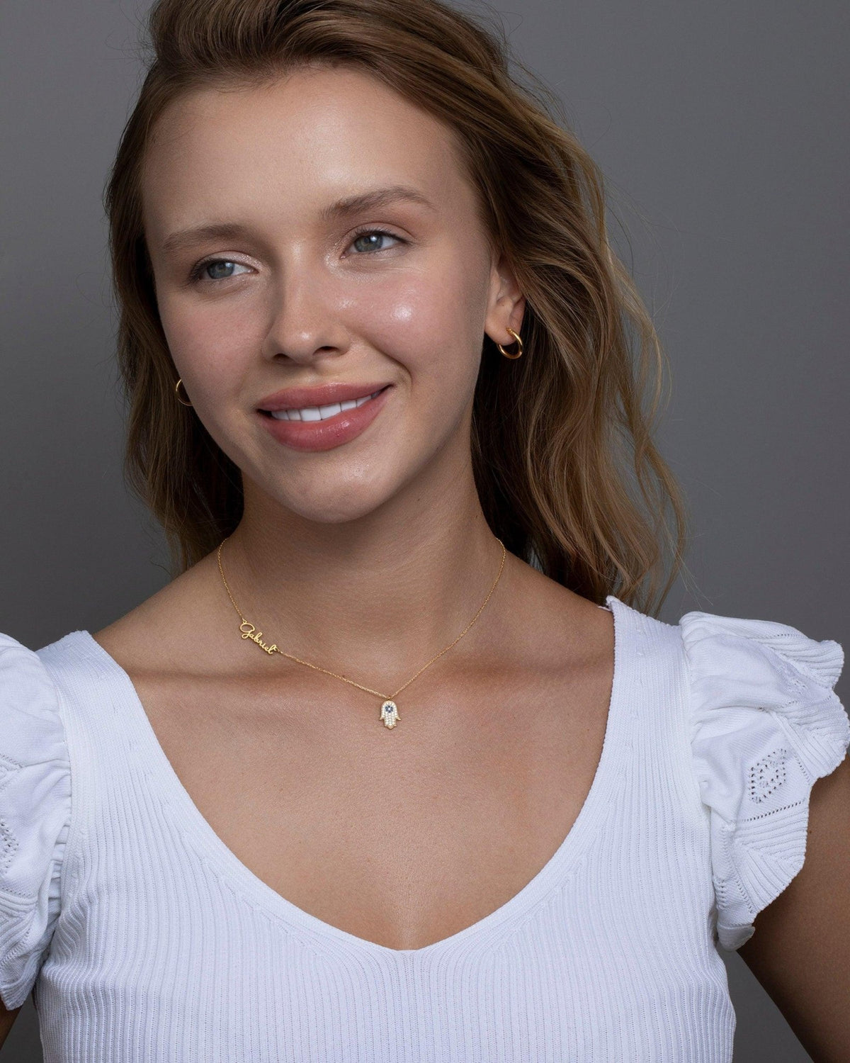 The Personalized Hamsa Name Necklace styled in 18K Gold Vermeil — elegant everyday jewelry. Hypoallergenic, no green marks.