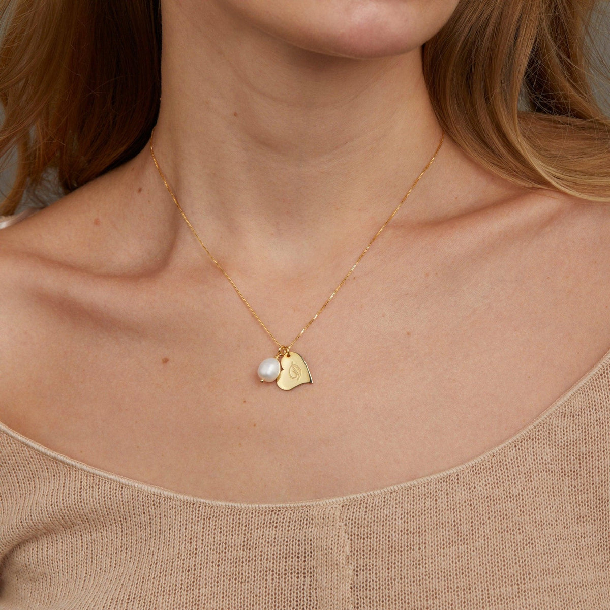 The Personalized Heart Initial and Pearl Necklace as a mother's day gift in 18K Gold Vermeil. Safe for sensitive skin, made.