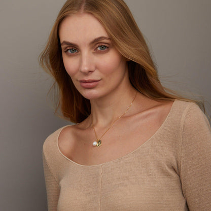 The Personalized Heart Initial and Pearl Necklace styled in 18K Gold Vermeil — elegant everyday jewelry. Hypoallergenic, no.