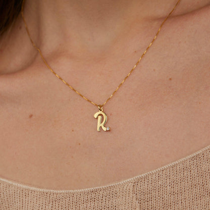 Close detail of the Personalized Initial Necklace with CZ Diamond in 18K Gold Vermeil with CZ Diamond. Safe for sensitive.