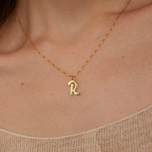 Close detail of the Personalized Initial Necklace with CZ Diamond in 18K Gold Vermeil with CZ Diamond. Safe for sensitive.