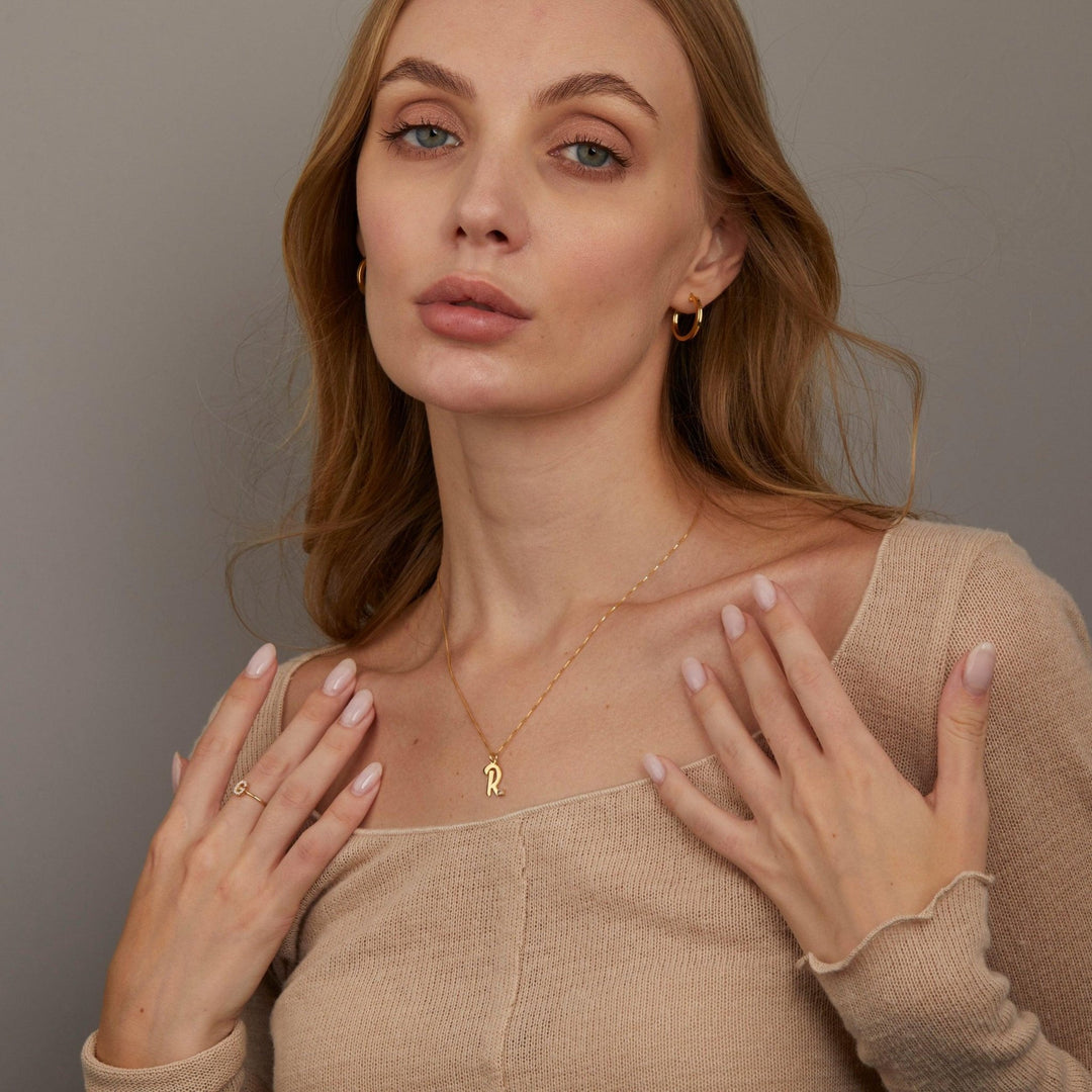 The Personalized Initial Necklace with CZ Diamond styled in 18K Gold Vermeil — elegant everyday jewelry. Hypoallergenic, no.
