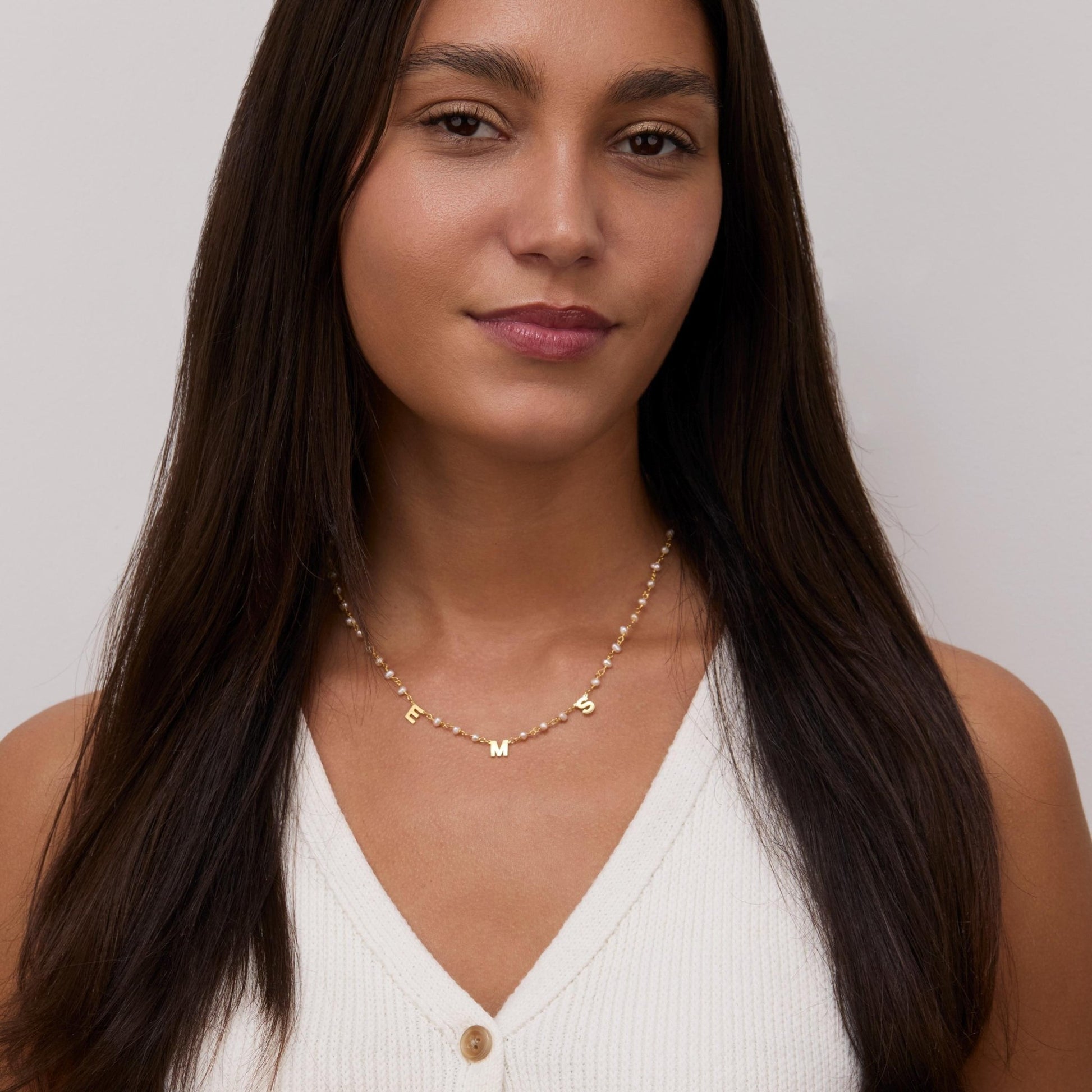 The Personalized Initial Pearl Necklace styled in 18K Gold Vermeil — elegant everyday jewelry. Hypoallergenic, no green.