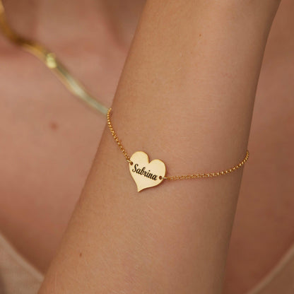 The Personalized Name Bracelet with Heart Charm as an anniversary gift in 18K Gold Vermeil. Safe for sensitive skin, made.