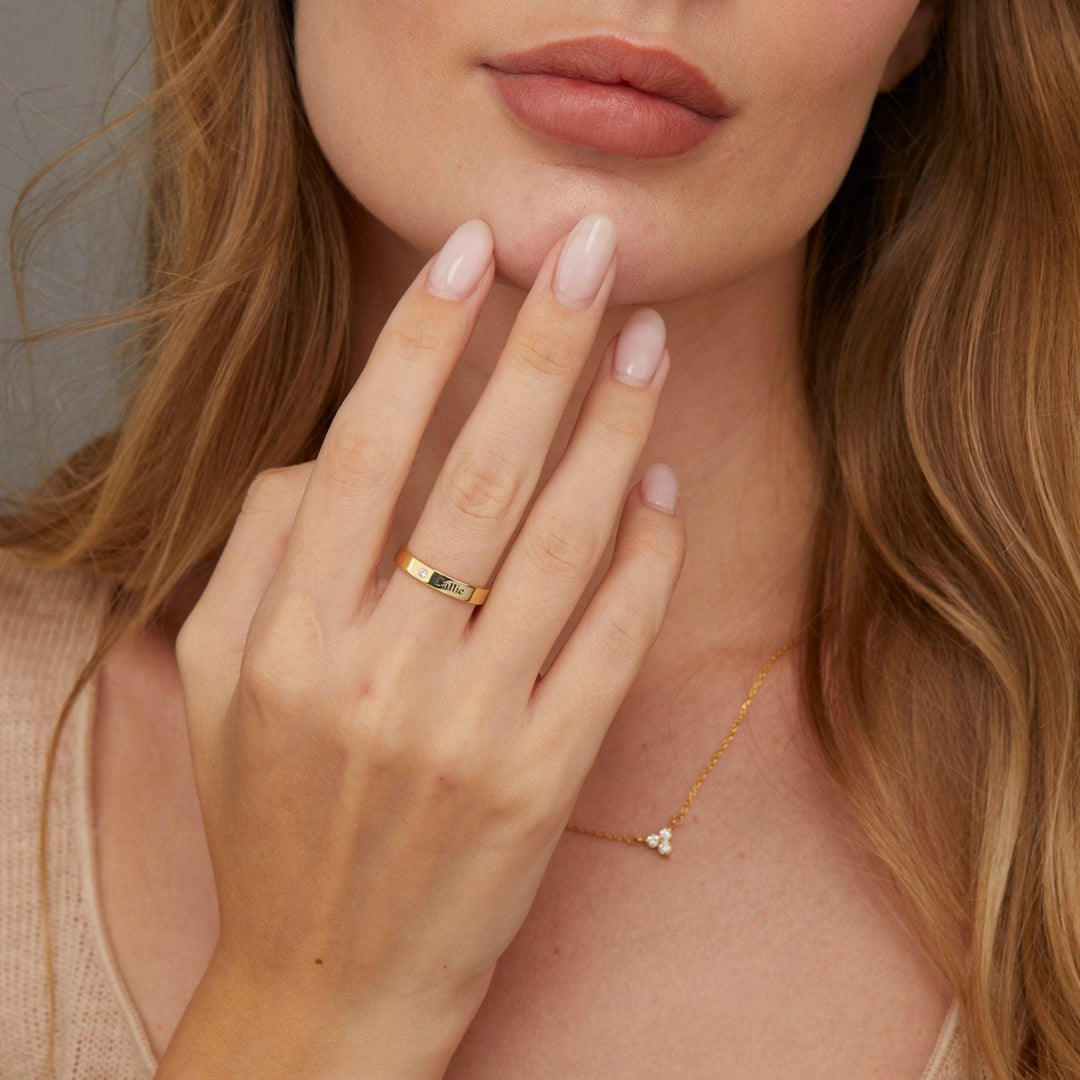 The Personalized Name Ring with Birthstone styled in 18K Gold Vermeil — elegant everyday jewelry. Tarnish-resistant.