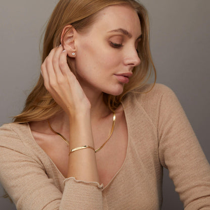 The Silver Name Bracelet with Figaro Chain styled in 18K Gold Vermeil — elegant everyday jewelry. Hypoallergenic, no green.