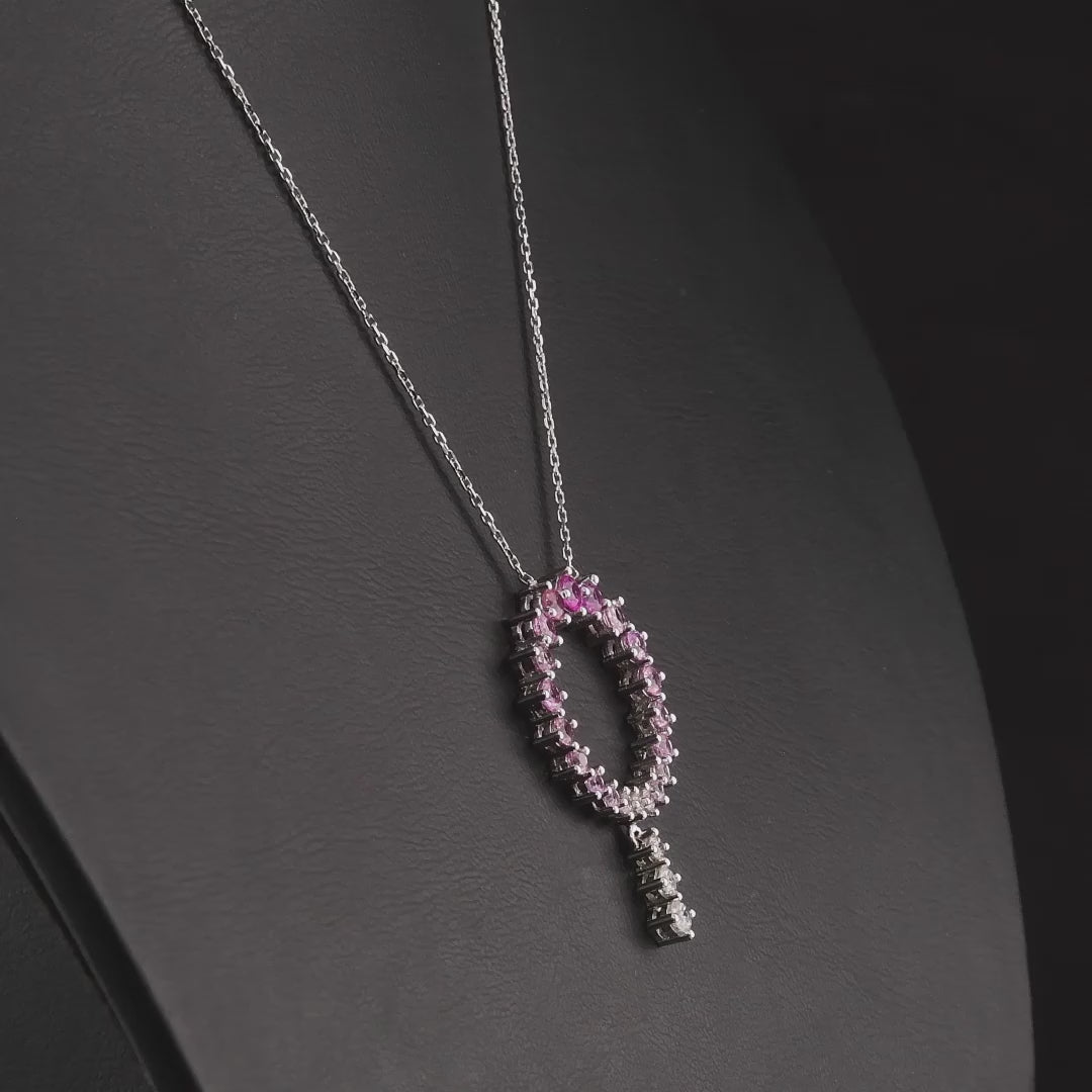 360 degree video of the pink gemstone and natural diamond open circle drop necklace in 14K white gold