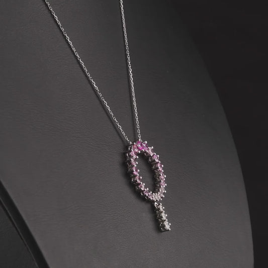 360 degree video of the pink gemstone and natural diamond open circle drop necklace in 14K white gold