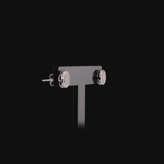360 degree view of the diamond cluster stud earrings with the baguette halo