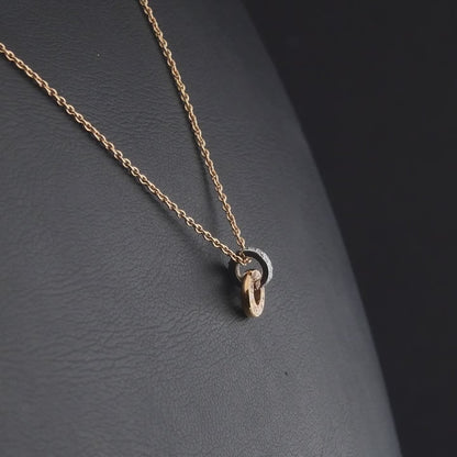 360 degree video of the natural diamond open circle pendant necklace in 18K rose gold
