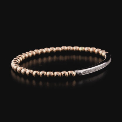 360-degree video of the natural diamond pavé bar bead bracelet in 14K rose and white gold