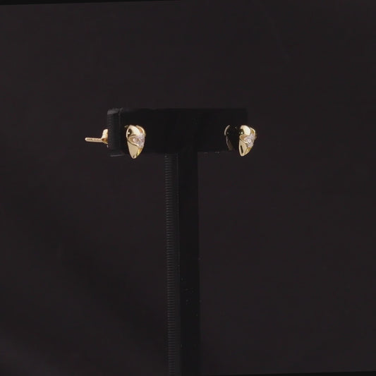 360 degree video of the 0.34 ct tw natural diamond heart stud earrings in 14K yellow gold