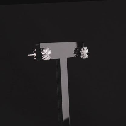 360 degree video of the pear-cut natural diamond flower stud earrings in 14K white gold