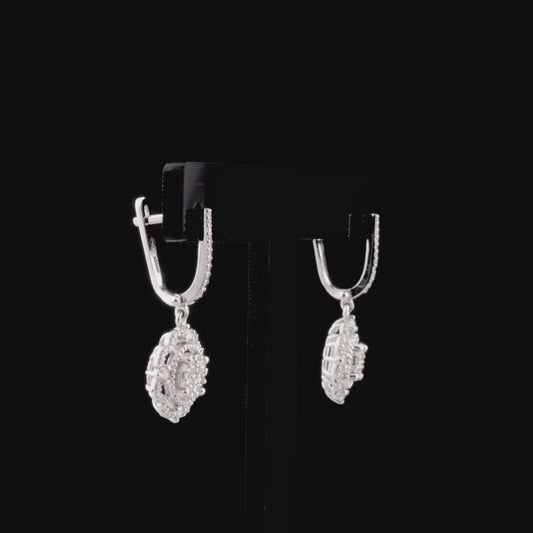 360-degree video of the natural diamond flower halo cluster drop earrings in 14K white gold.