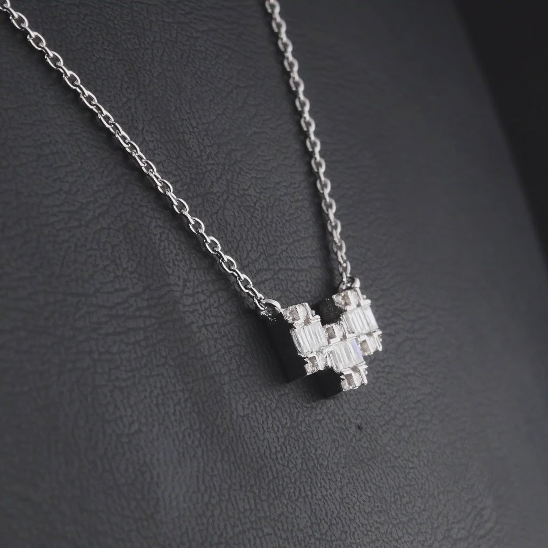 360 degree video of the natural diamond baguette geometric bar necklace in 18K white gold