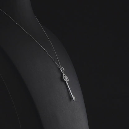 360 degree video of the natural diamond trefoil key pendant necklace in 14K white gold