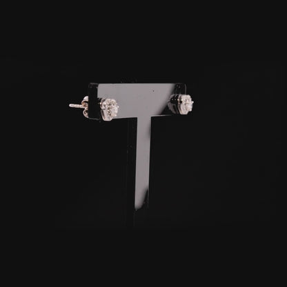 360 degree video of the natural diamond heart halo stud earrings in 18K white gold