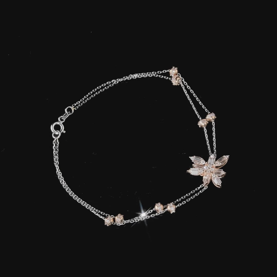 360 degree video of the natural diamond baguette flower double chain bracelet in 14K rose and white gold
