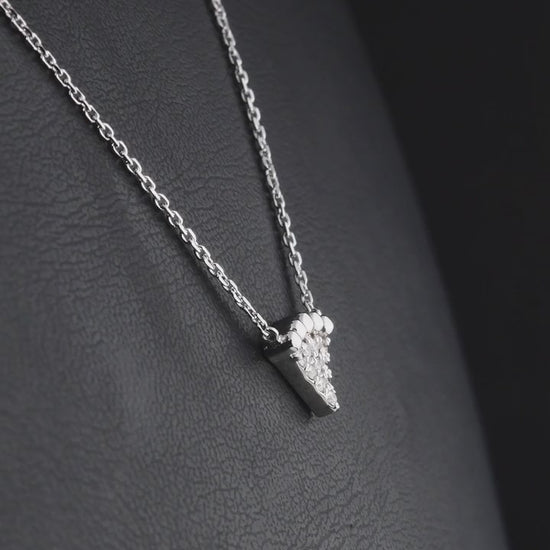 360 degree video of a beaded triangle natural diamond necklace in 14K white gold.
