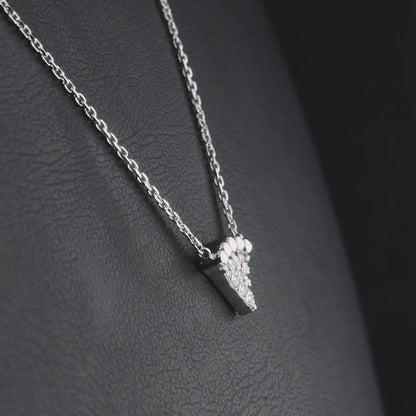 360 degree video of a beaded triangle natural diamond necklace in 14K white gold.