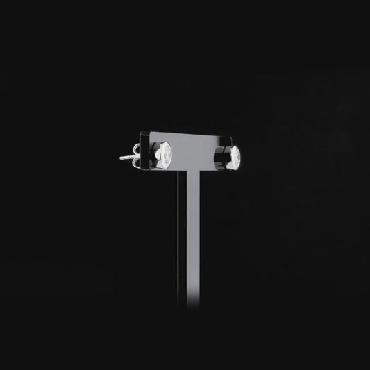 360-degree video of the bezel-set round natural diamond solitaire stud earrings in 14K white gold