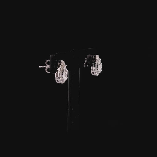 360-degree video of the pear-shaped natural diamond cluster halo stud earrings in 14K white gold