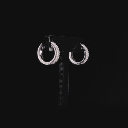 360 degree view of the diamond baguette huggie hoop earrings