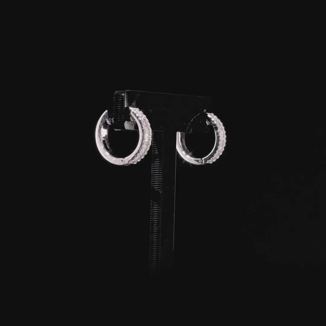 360 degree view of the diamond baguette huggie hoop earrings