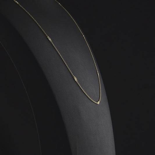 360-degree video of the natural diamond bezel station necklace in 14K yellow gold