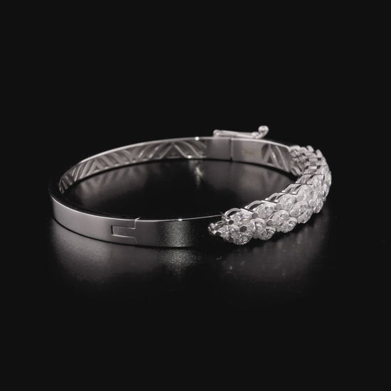 360 degree video of the natural diamond marquise three-row bangle bracelet in 18K white gold