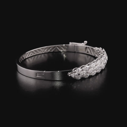 360 degree video of the natural diamond marquise three-row bangle bracelet in 18K white gold