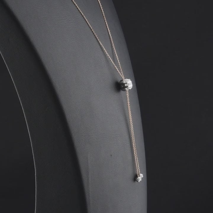 360 degree video of the natural diamond barrel lariat necklace in 14K rose and white gold