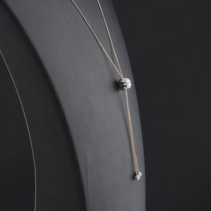 360 degree video of the natural diamond barrel lariat necklace in 14K rose and white gold