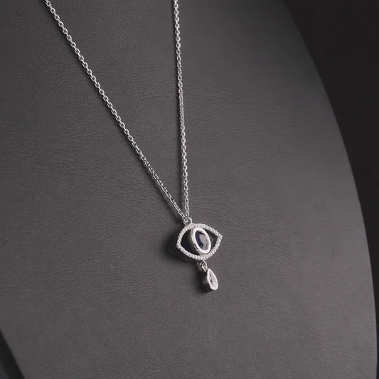 360 degree video of the evil eye sapphire and natural diamond pendant necklace in 14K white gold