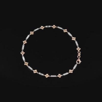 360 degree video of the natural diamond baguette flower station bracelet in 14K white and rose gold