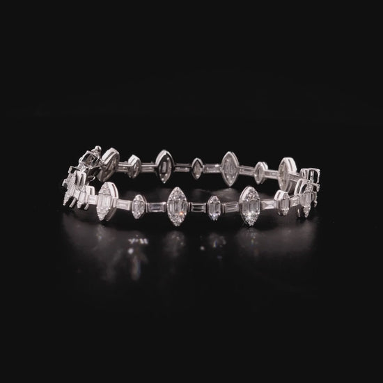 360-degree video of the natural diamond baguette marquise cluster bracelet in 14K white gold