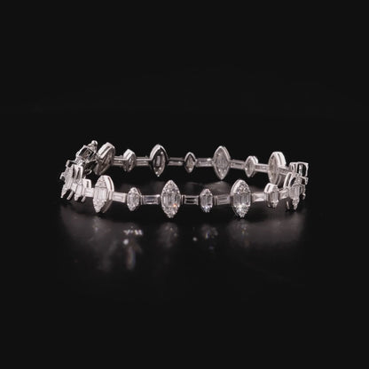 360-degree video of the natural diamond baguette marquise cluster bracelet in 14K white gold