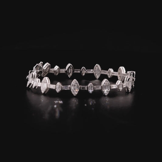 360-degree video of the natural diamond baguette marquise cluster bracelet in 14K white gold