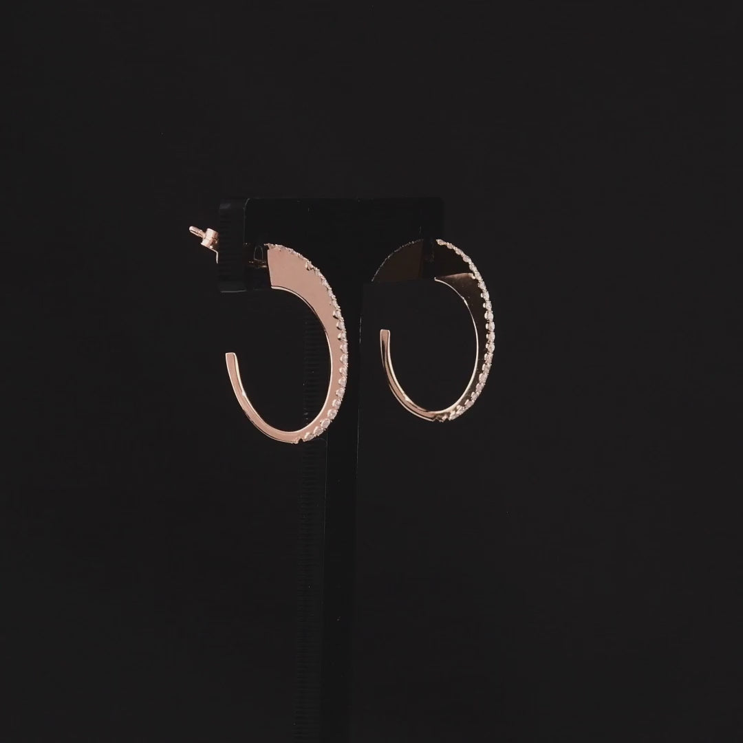 360-degree video of the natural diamond oval J hoop earrings in 14K rose gold