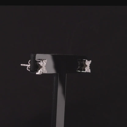 360 degree video of the baguette natural diamond flower stud earrings in 14K white gold