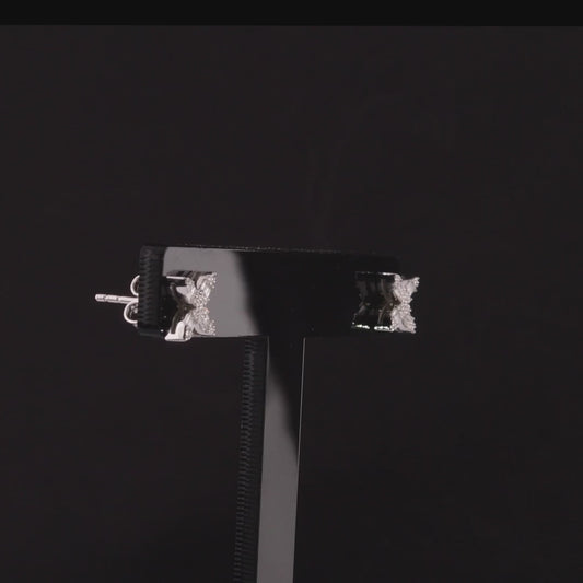360 degree video of the baguette natural diamond flower stud earrings in 14K white gold