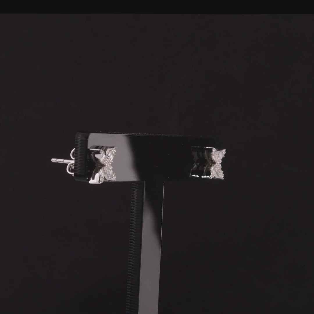 360 degree video of the baguette natural diamond flower stud earrings in 14K white gold