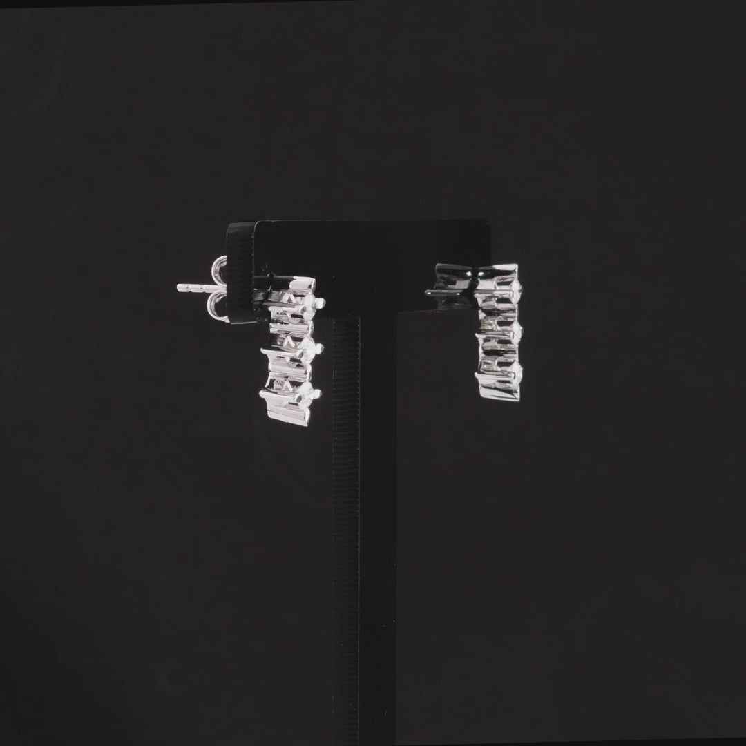 360-degree video of the three-star natural diamond drop stud earrings in 14K white gold