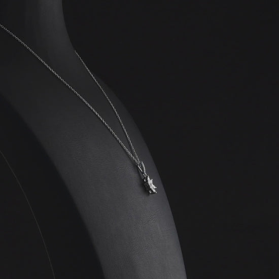 Marquise diamond flower pendant in 14K white gold turning 360 degrees